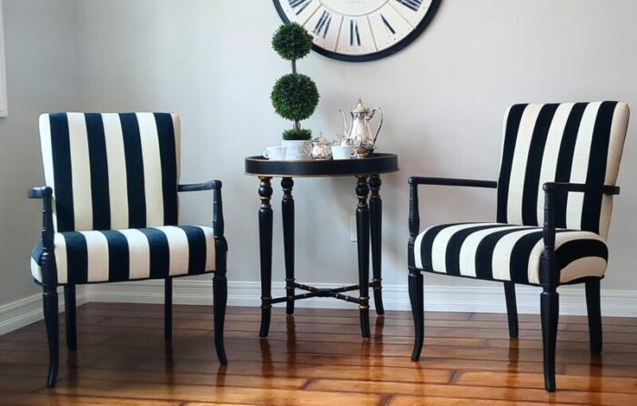 1940s pair of black chairs sheraton style with new upholstery in cream and black stripes 3690