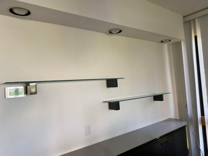 1980s modern floating glass shelves with black lacquer brackets a pair 0443