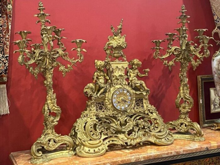 19th century french gilt bronze candelabras and clock garniture 1