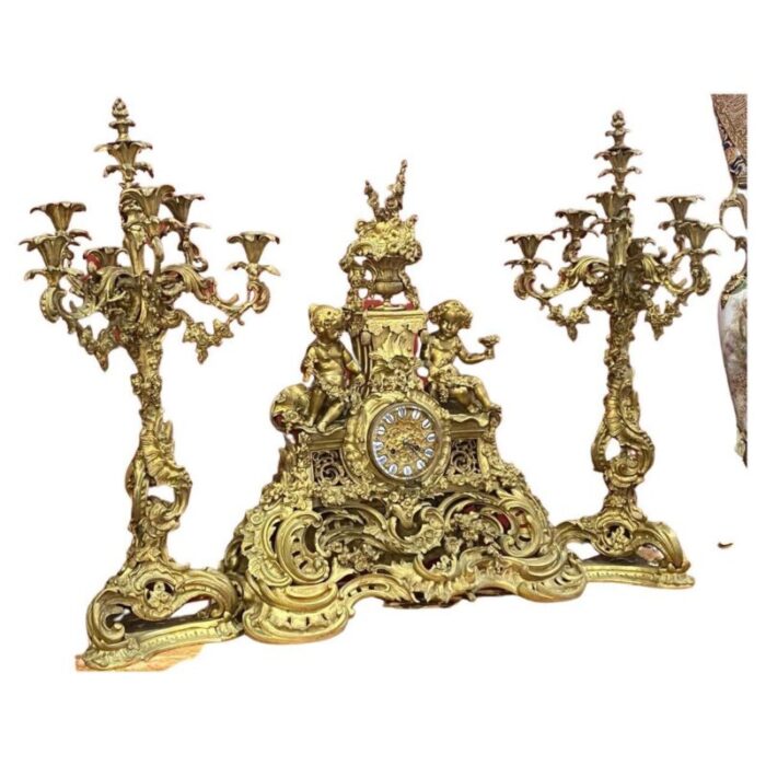 19th century french gilt bronze candelabras and clock garniture 2