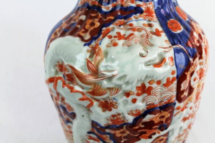 19th century imari porcelain baluster vase with dragon relief decoration 5