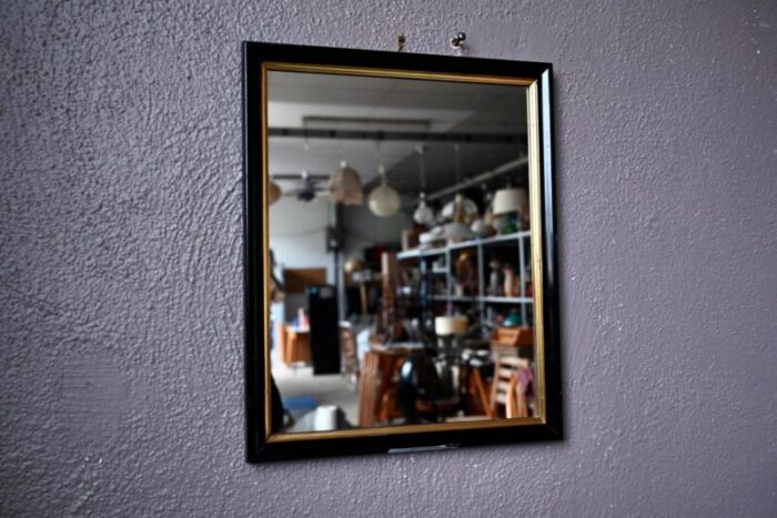 antique french mirror in black and gold 1