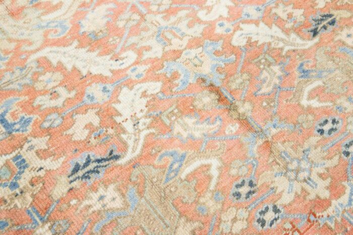 antique hand knotted persian heriz wool rug in peach with allover motif 0274