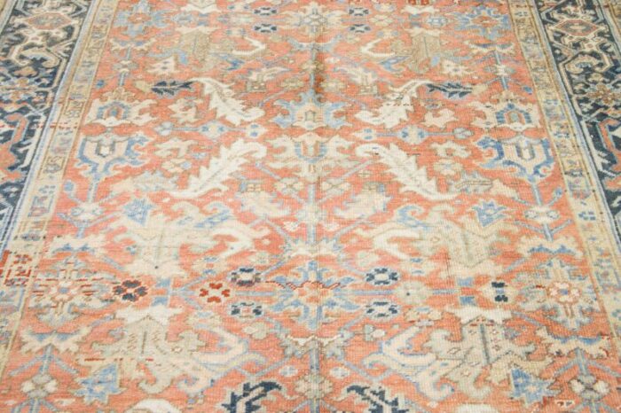 antique hand knotted persian heriz wool rug in peach with allover motif 3877