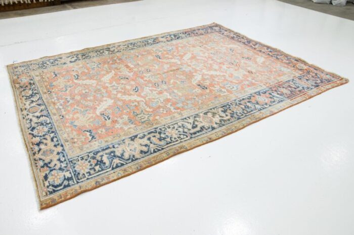 antique hand knotted persian heriz wool rug in peach with allover motif 9812