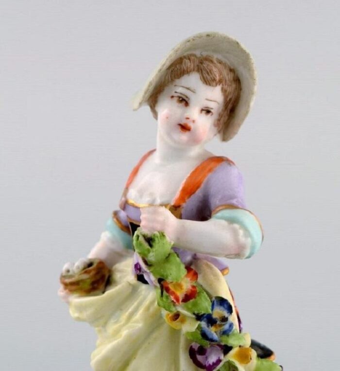 antique hand painted porcelain figure of girl with flowers from augustus rex germany 2