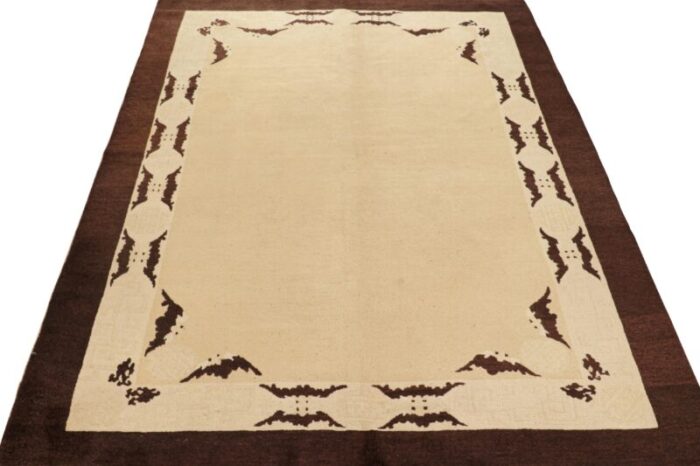 antique peking rug with beige open field and brown pictorials from rug and kilim 3661