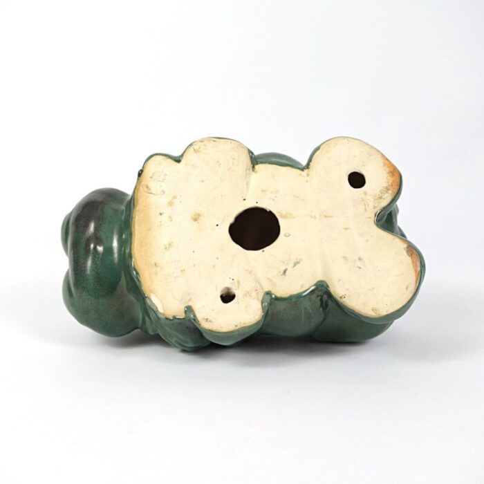 big green ceramic statue of hippopotamus 9