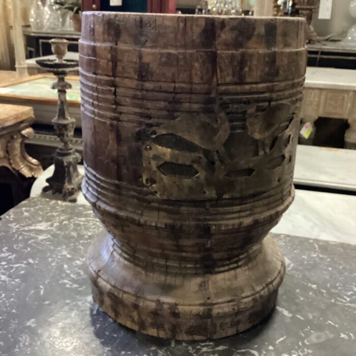 early 20th century wooden vessel from india with visible woodgrain and hand carved brass birds on front 0437