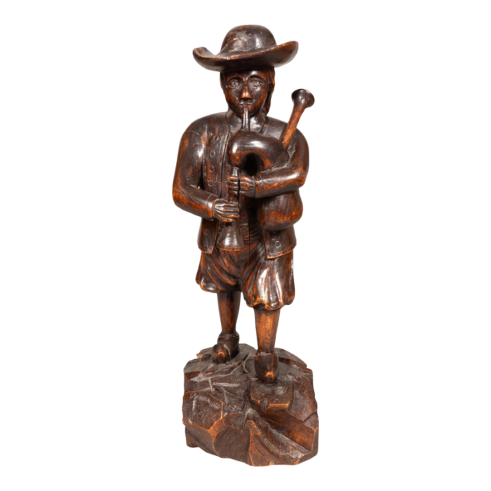 early victorian carving of a bagpiper 0568