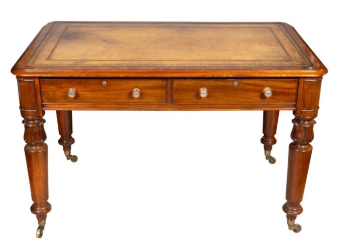 early victorian mahogany writing table with cope and collinson casters 4896