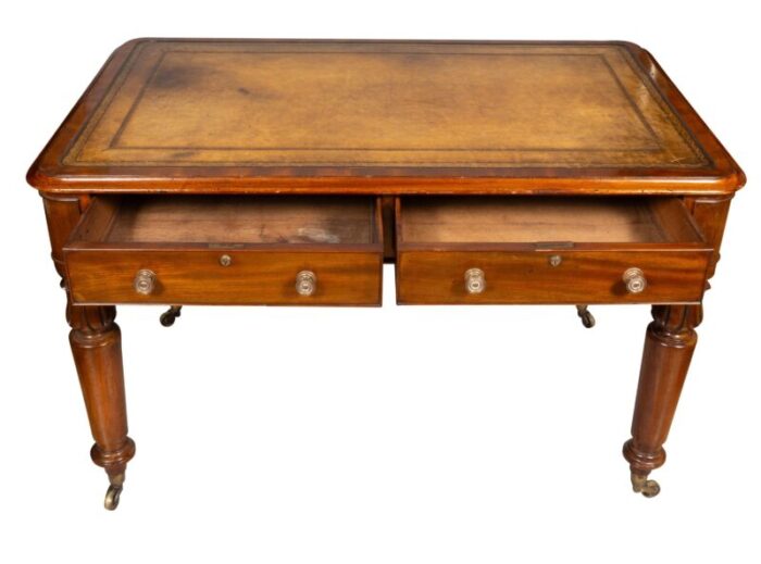 early victorian mahogany writing table with cope and collinson casters 9528