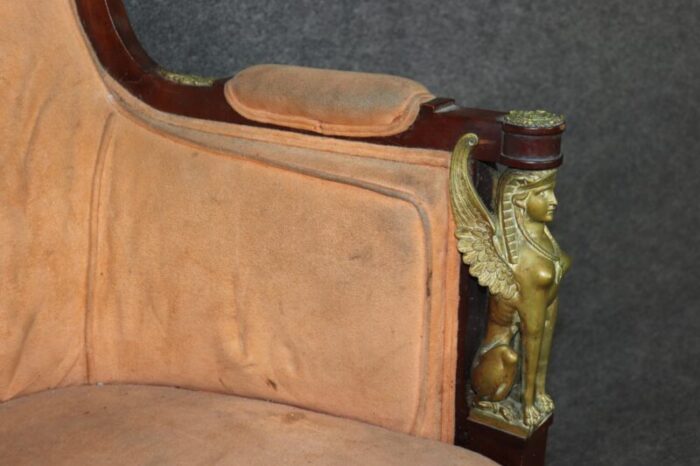 french empire egyptian revival solid mahogany bergere chair with bronze sphinxs 1156