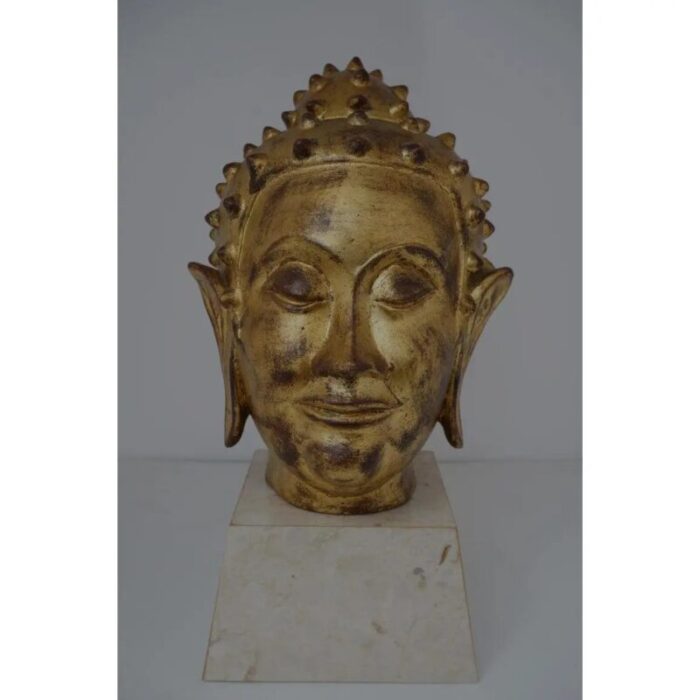 gold leaf on terracotta buddha head mid century 2848