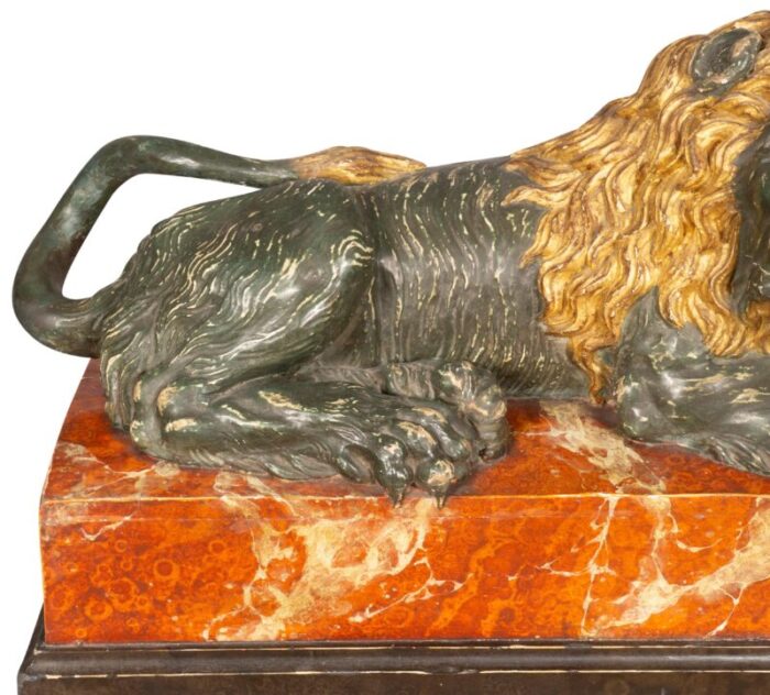 italian carved wood and painted reclining lion 1460