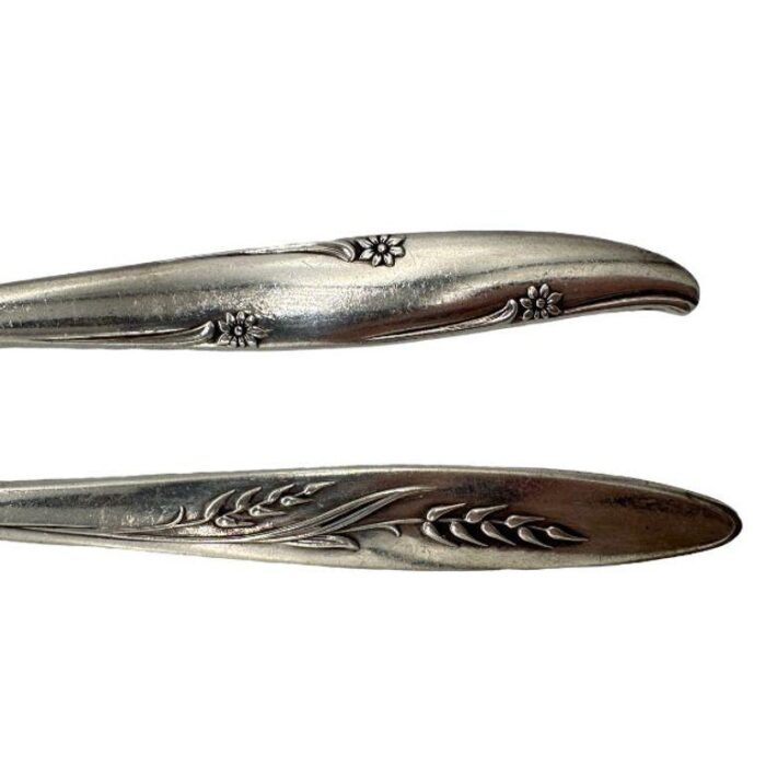 mid century silver flower and song of autumn serving spoons by oneida silver pair 0748