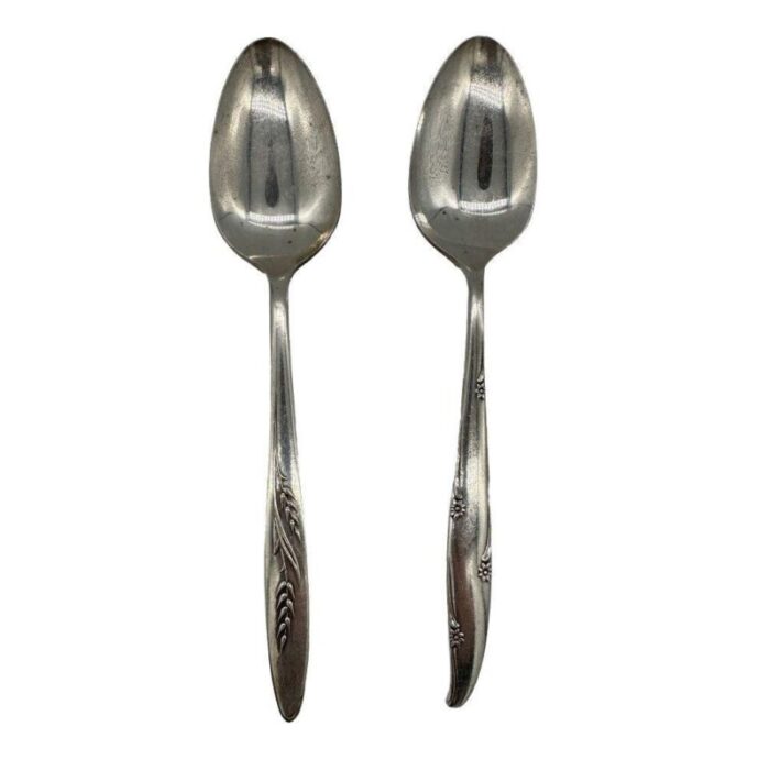 mid century silver flower and song of autumn serving spoons by oneida silver pair 3524