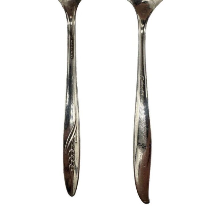 mid century silver flower and song of autumn serving spoons by oneida silver pair 7400