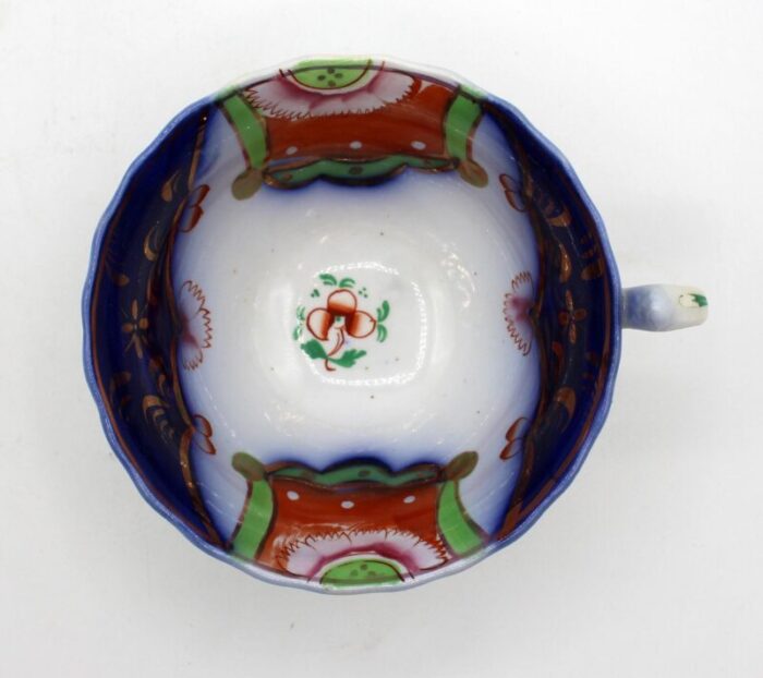 mid late 19th century gaudy welsh herald pattern cup and saucer 1083