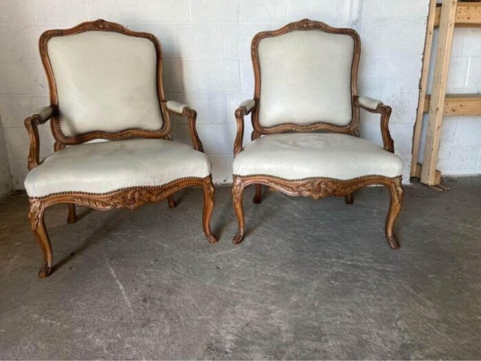 pair of antique louis xv style fruitwood leather armchairs 4693