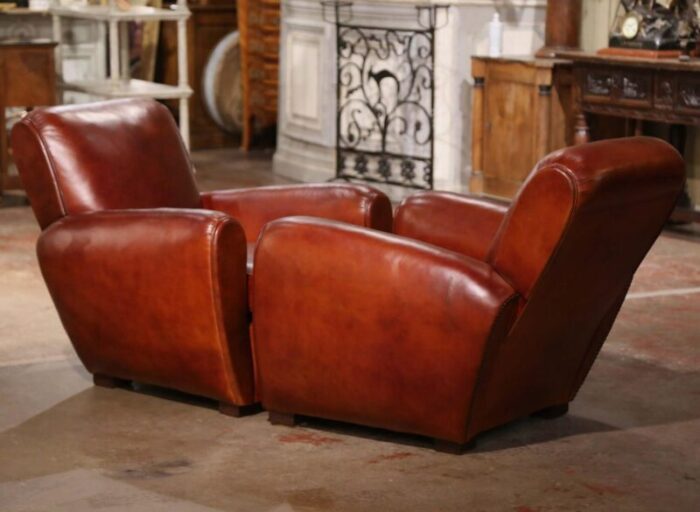 pair of early 20th century french art deco brown leather club armchairs 4617