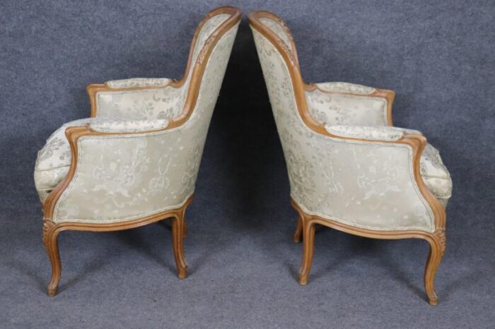 pair of gorgeous french carved louis xv bergere chairs circa 1940s era 5526