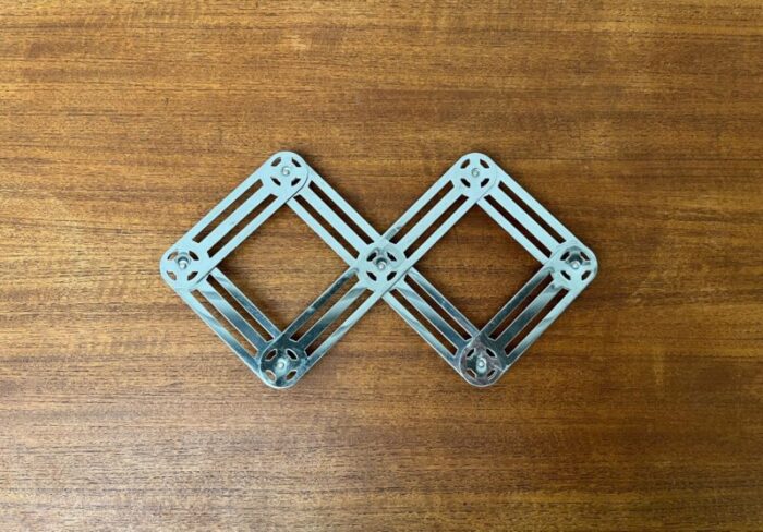 postmodern german metal extendable trivet coaster from zack 1