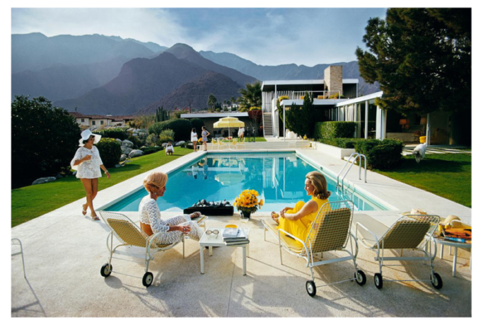 slim aarons catch up by the pool 1970s estate stamped photographic print 3044