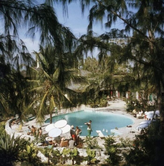 slim aarons eleuthera pool party estate stamped photographic print 1964 2020s 4036