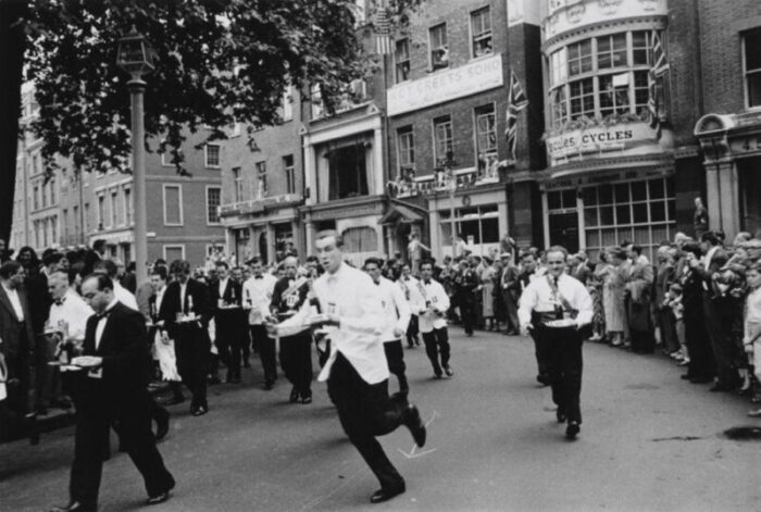 slim aarons soho waiters race 1955 silver gelatin fibre print 9704