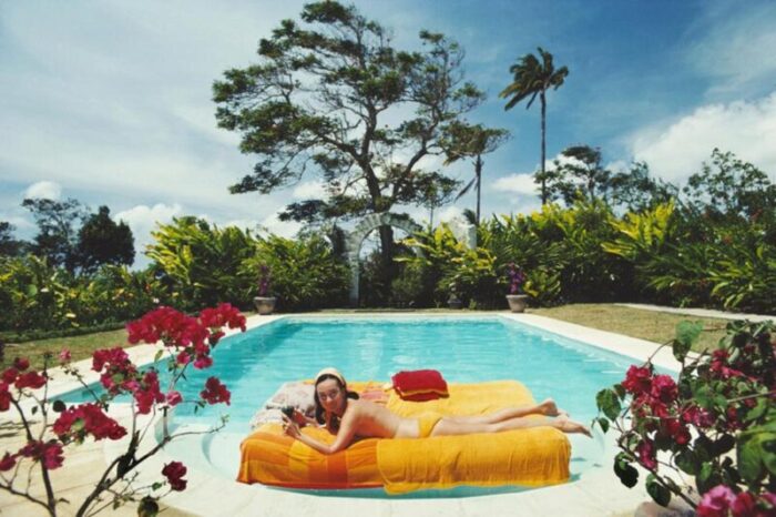 slim aarons sunbathing in barbados 1976 photographic print 5834