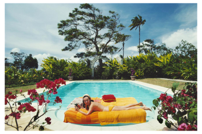 slim aarons sunbathing in barbados 1976 photographic print 7859