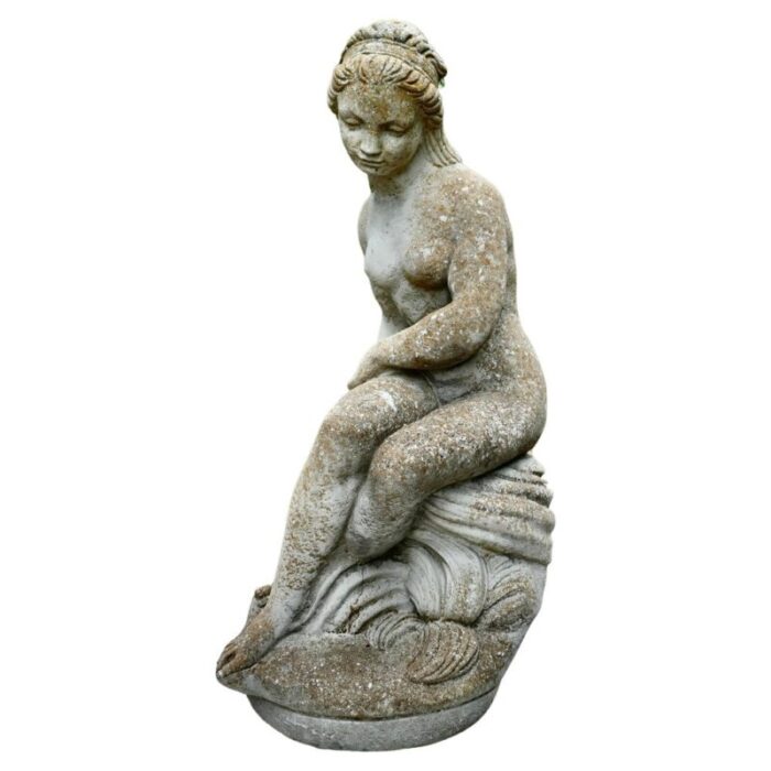 statue of the goddess tyche holding a snake 1920s 1