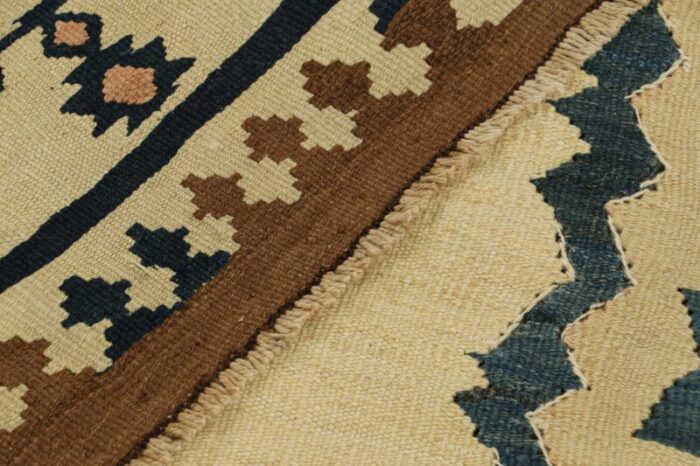 vintage kilim with beige open field and geometric borders from rug and kilim 2389