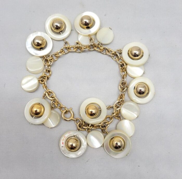 vintage signed napier goldtone mother of pearl charm bracelet 3647