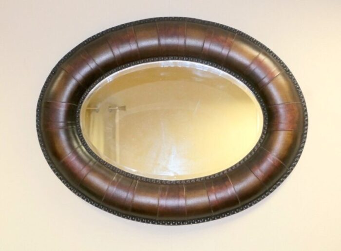 vintage wall mirror in leather oval studded frame 1