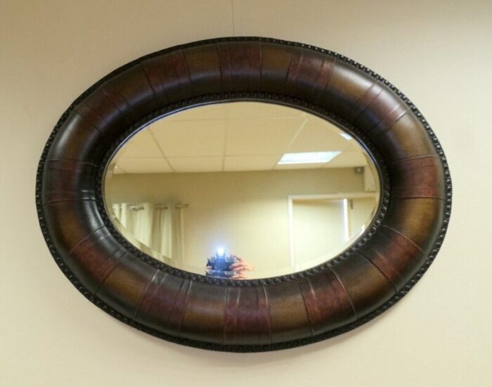 vintage wall mirror in leather oval studded frame 2