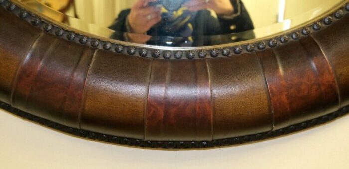 vintage wall mirror in leather oval studded frame 3