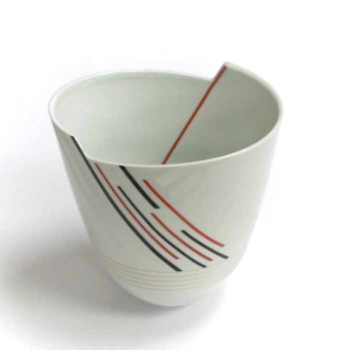 white porcelain vase with red and black lines by horst gobbels 9311